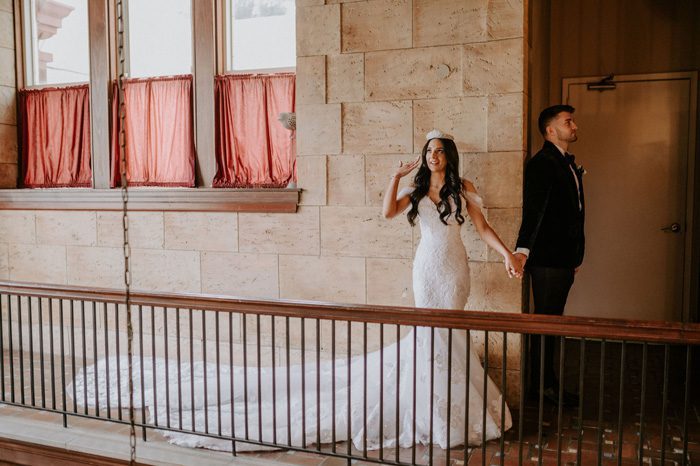 Bride and Groom First Look | Glam Wedding with a Rock and Roll Surprise at The Treasury | Cristal + Steven