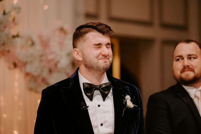 emotional groom during wedding ceremony | Glam Wedding with a Rock and Roll Surprise at The Treasury | Cristal + Steven