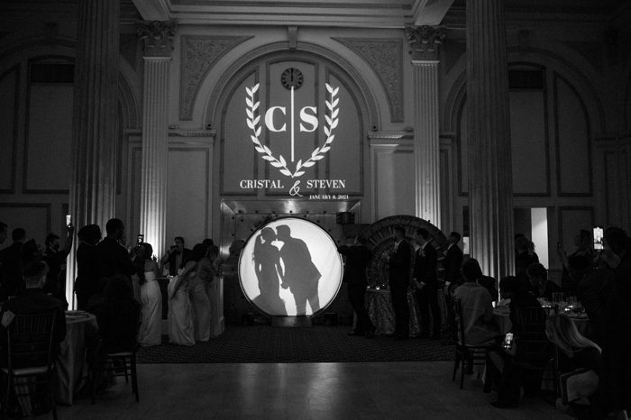 wedding reception entrance from the vault | Glam Wedding with a Rock and Roll Surprise at The Treasury | Cristal + Steven