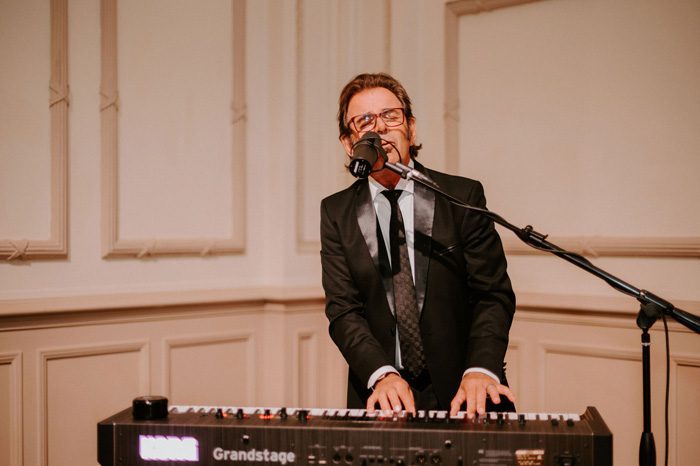 Rock and roll wedding performance Journey | Glam Wedding with a Rock and Roll Surprise at The Treasury | Cristal + Steven