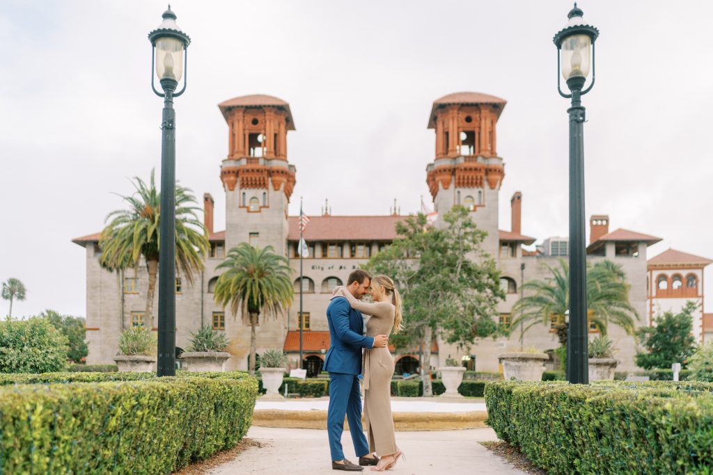 Couple outside the Lightner Museum taking engagement photos