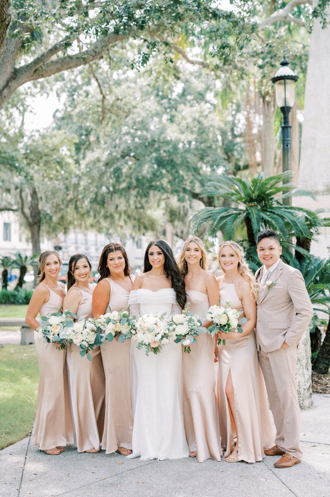 Bride and bridesmaids take photos in St. Augustine
