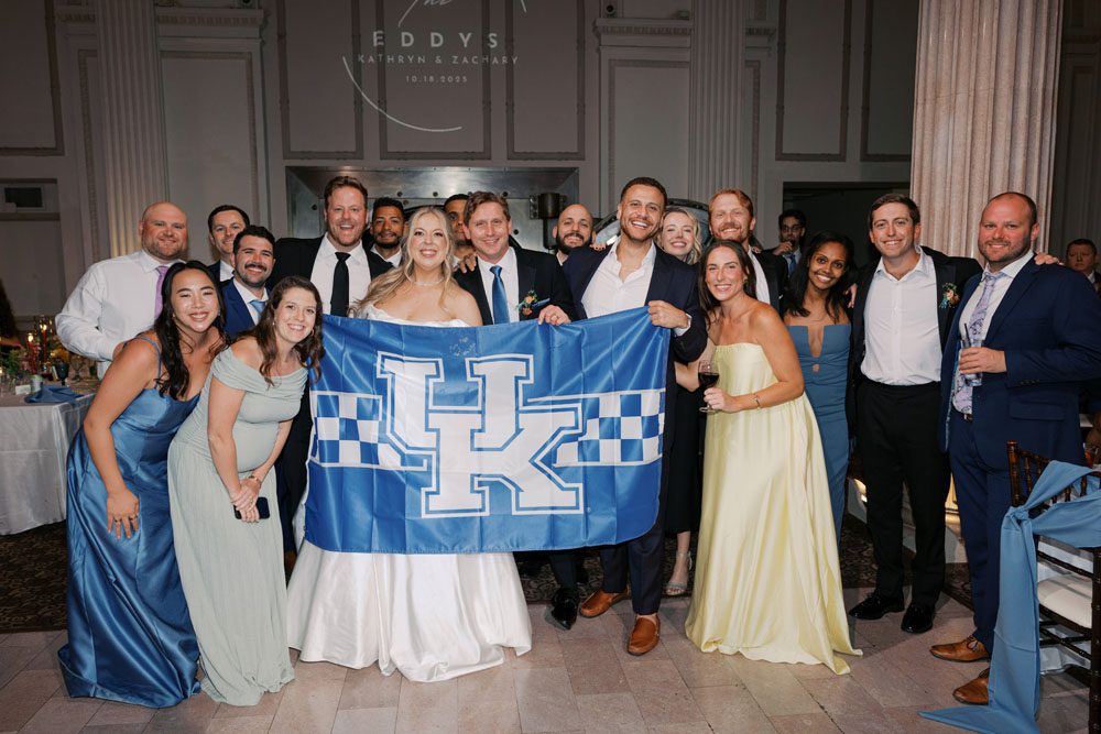 Bride and Groom photo with guests