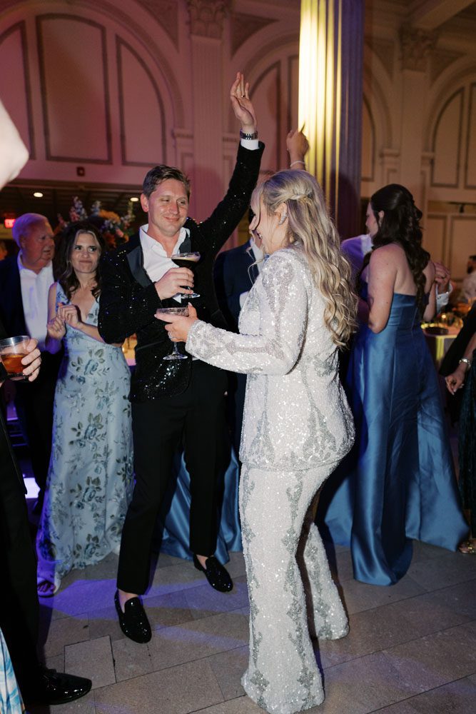 Couple dancing during reception with espresso martinis