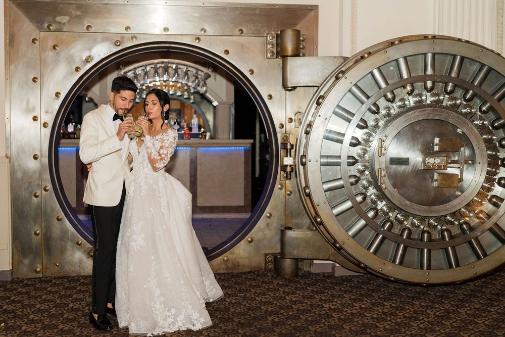 Wedding portraits inside the Vault Bar at The Treasury on the Plaza