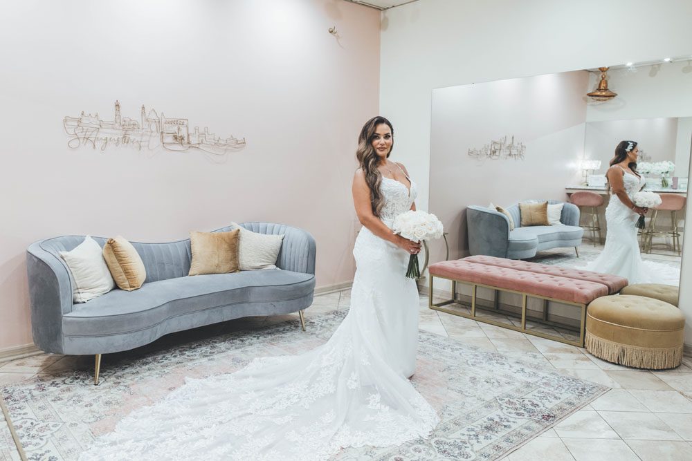 Bride getting ready in the Treasury Lounge at The Treasury on the Plaza.