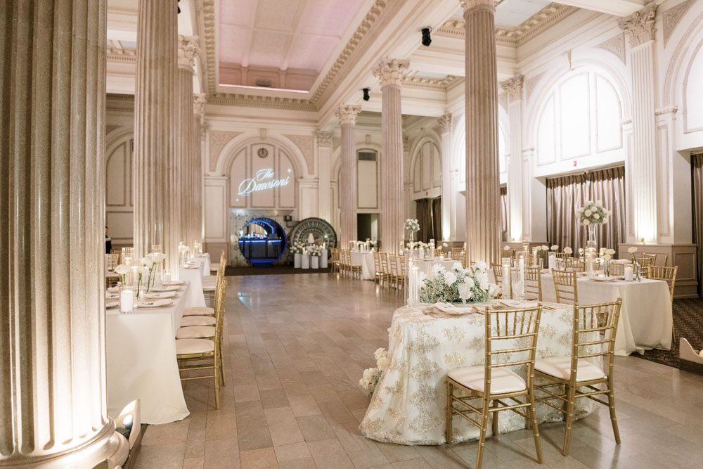 Wedding reception tables inside the Grand Ballroom with Art Deco architecture.